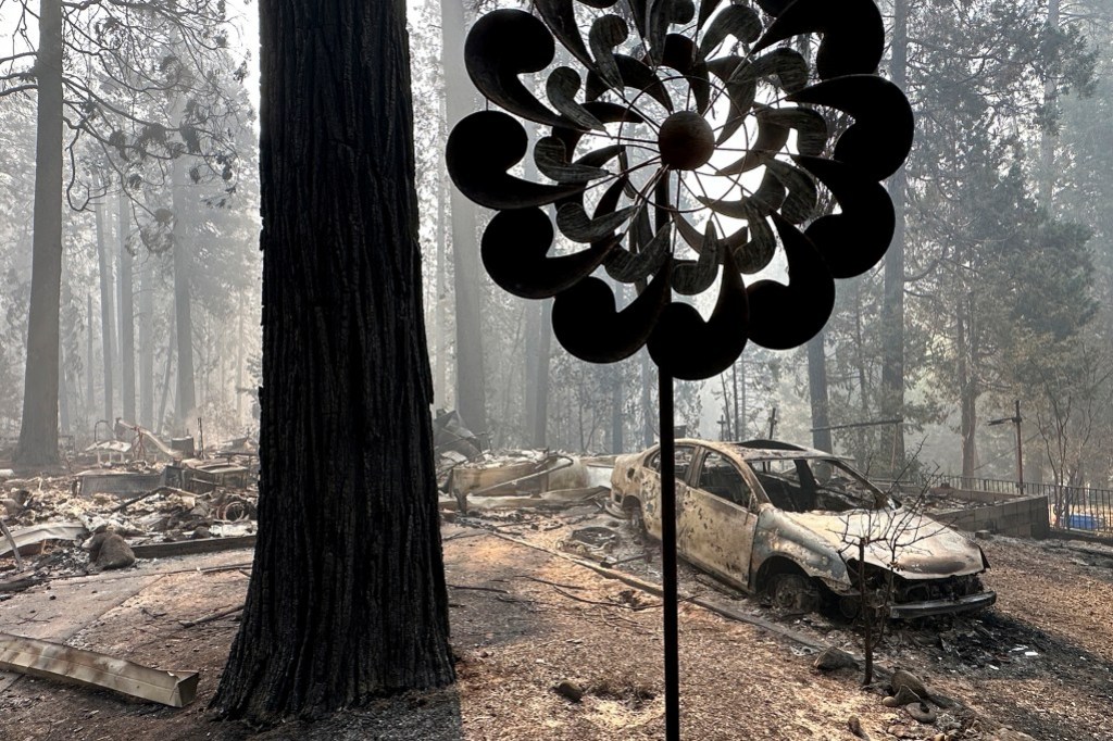 A property damaged by wildfire is seen in the aftermath of the Park Fire in the Cohasset community of Butte County on July 28, 2024. Photo by Eugene Garcia, AP Photo