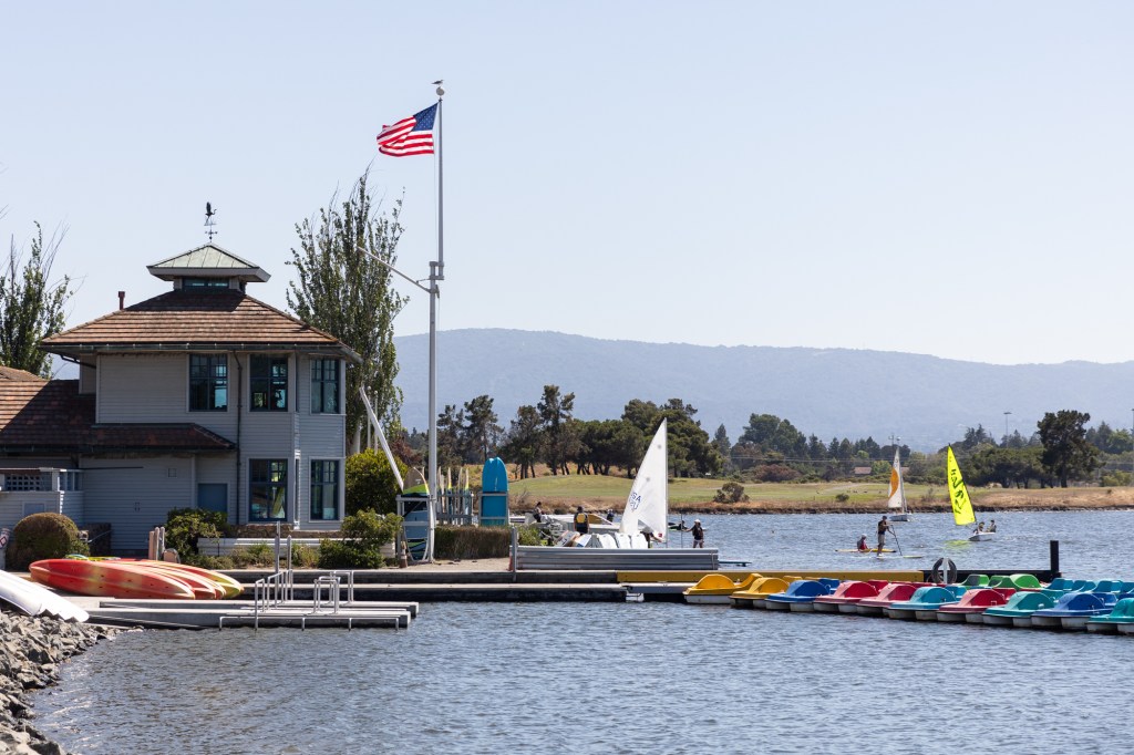 The city of Mountain View, Mountain View Whisman School District and Mountain View Los Altos Union High School District are trying to negotiate a long-term agreement on how to share funding from the Shoreline Regional Park Community, a special tax district created in 1969 that covers much of the city north of Highway 101. The area includes Shoreline Lake, above. Photo by Magali Gauthier.